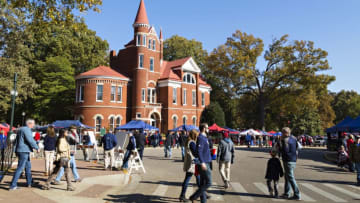 OXFORD, MS - NOVEMBER 26: Fans walking around The Grove and in front of Ventress Hall of the Mississippi Rebels before a game against the Mississippi State Bulldogs at Vaught-Hemingway Stadium on November 26, 2016 in Oxford, Mississippi. (Photo by Wesley Hitt/Getty Images)