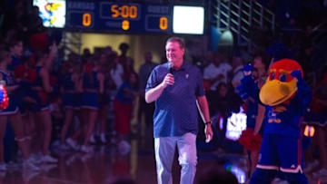 Kansas men's basketball head coach Bill Self walks on to the court of Allen Fieldhouse for Friday's Late Night in the Phog inside Allen Fieldhouse.