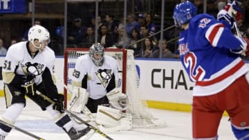 Mar 27, 2016; New York, NY, USA; New York Rangers center Eric Staal (12) shoots and scores a goal past Pittsburgh Penguins goalie Marc-Andre Fleury (29) during the second period at Madison Square Garden. Mandatory Credit: Adam Hunger-USA TODAY Sports