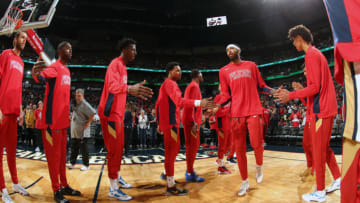 NEW ORLEANS, LA - October 11: Brandon Ingram #14 of the New Orleans Pelicans high fives his teammates during a pre-season game against the Utah Jazz on October 11, 2019 at the Smoothie King Center in New Orleans, Louisiana. NOTE TO USER: User expressly acknowledges and agrees that, by downloading and or using this Photograph, user is consenting to the terms and conditions of the Getty Images License Agreement. Mandatory Copyright Notice: Copyright 2019 NBAE (Photo by Layne Murdoch Jr./NBAE via Getty Images)