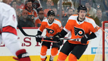 PHILADELPHIA, PA - NOVEMBER 05: Justin Braun #61 and Shayne Gostisbehere #53 of the Philadelphia Flyers skate against the Carolina Hurricanes on November 5, 2019 at the Wells Fargo Center in Philadelphia, Pennsylvania. (Photo by Len Redkoles/NHLI via Getty Images)