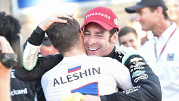 2016 IndyCar champion Simon Pagenaud accepts a congratulatory hug from Mikhail Aleshin. Photo Credit: Chris Owens/Courtesy of IndyCar