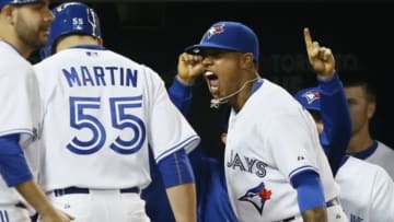 Sep 23, 2015; Toronto, Ontario, CAN; Toronto Blue Jays starting pitcher Marcus Stroman (6) reacts to catcher Russell Martin (55) on his three run home run in the seventh inning against the New York Yankees at Rogers Centre. Mandatory Credit: John E. Sokolowski-USA TODAY Sports