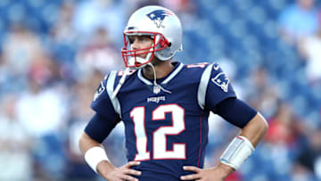 FOXBOROUGH, MA - AUGUST 9 : Tom Brady #12 of the New England Patriots looks on before the preseason game between the New England Patriots and the Washington Redskins at Gillette Stadium on August 9, 2018 in Foxborough, Massachusetts. (Photo by Maddie Meyer/Getty Images)
