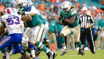 Oct 23, 2016; Miami Gardens, FL, USA; Miami Dolphins running back Jay Ajayi (23) carries the ball during the second half against the Buffalo Bills at Hard Rock Stadium. The Dolphins won 28-25. Mandatory Credit: Steve Mitchell-USA TODAY Sports