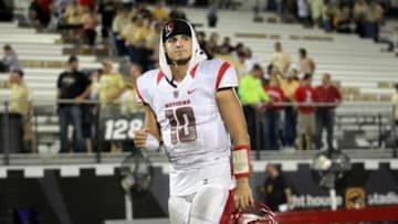 Nov 21, 2013; Orlando, FL, USA; Rutgers Scarlet Knights quarterback Gary Nova (10) walks off the field after the game against the UCF Knights at Bright House Networks Stadium. Mandatory Credit: John Munson/THE STAR-LEDGER via USA TODAY Sports