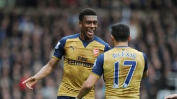 LONDON, ENGLAND - APRIL 09: Alexis Sanchez celebrates scoring the 2nd Arsenal goal with Alex Iwobi during the Barclays Premier League match between West Ham United and Arsenal at the Boleyn Ground on April 9, 2016 in London, England. (Photo by Stuart MacFarlane/Arsenal FC via Getty Images). (Photo by Stuart MacFarlane/Arsenal FC via Getty Images)