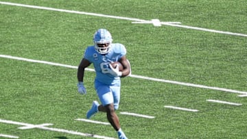 Oct 24, 2020; Chapel Hill, North Carolina, USA; North Carolina Tar Heels running back Michael Carter (8) with the ball in the first quarter at Kenan Memorial Stadium. Mandatory Credit: Bob Donnan-USA TODAY Sports