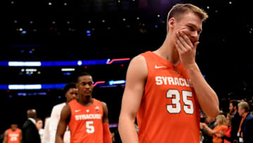 NEW YORK, NEW YORK - NOVEMBER 15: NEW YORK, NEW YORK - NOVEMBER 15: Buddy Boeheim #35 of the Syracuse Orange reacts while walking off the court after Syracuse Orange lost the game 83-76 to the Connecticut Huskies during the 2k Empire Classic at Madison Square Garden on November 15, 2018 in New York City. (Photo by Sarah Stier/Getty Images)