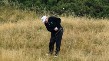 TURNBERRY, SCOTLAND - JULY 15: U.S. President Donald Trump plays a round of golf at Trump Turnberry Luxury Collection Resort during the U.S. President's first official visit to the United Kingdom on July 15, 2018 in Turnberry, Scotland. The President of the United States and First Lady, Melania Trump on their first official visit to the UK after yesterday's meetings with the Prime Minister and the Queen is in Scotland for private weekend stay at his Turnberry. (Photo by Leon Neal/Getty Images)