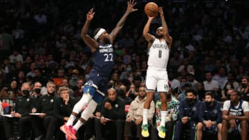 Oct 14, 2021; Brooklyn, New York, USA; Brooklyn Nets guard Patty Mills (8) shoots against Minnesota Timberwolves guard Patrick Beverley (22) during the third quarter at Barclays Center (Brad Penner-USA TODAY Sports).
