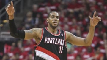 Apr 20, 2014; Houston, TX, USA; Portland Trail Blazers forward LaMarcus Aldridge (12) celebrates after scoring during the first quarter against the Houston Rockets in game one during the first round of the 2014 NBA Playoffs at Toyota Center. Mandatory Credit: Troy Taormina-USA TODAY Sports