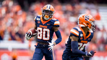 SYRACUSE, NY - SEPTEMBER 28: Taj Harris #80 of the Syracuse Orange carries a touchdown reception during the third quarter against the Holy Cross Crusaders at the Carrier Dome on September 28, 2019 in Syracuse, New York. Syracuse defeats Holy Cross 41-3. (Photo by Brett Carlsen/Getty Images)
