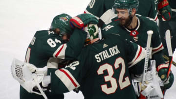 ST. PAUL, MN - OCTOBER 20: Mikael Granlund #64 of the Minnesota Wild and Alex Stalock #32 of the Minnesota Wild celebrate an overtime win after a game between the Minnesota Wild and Tampa Bay Lightning at Xcel Energy Center on October 20, 2018 in St. Paul, Minnesota. The Wild defeated the Lightning 5-4 in overtime.(Photo by Bruce Kluckhohn/NHLI via Getty Images)