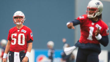 Auburn football legend Cam Newton stood up for a former Crimson Tide QB now starting for his former team after an ex-NFL coach called him a "peashooter" (Photo by Kathryn Riley/Getty Images)