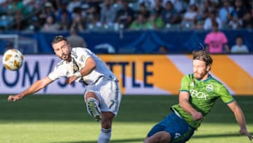 CARSON, CA - SEPTEMBER 23: Gustav Svensson #4 of Seattle Sounders blocks a shot by Romain Alessandrini #7 of Los Angeles Galaxy during the Los Angeles Galaxy's MLS match against Seattle Sounders at the StubHub Center on September 23, 2018 in Carson, California. Los Angeles Galaxy won the match 3-0(Photo by Shaun Clark/Getty Images)