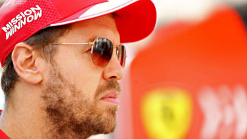 ABU DHABI, UNITED ARAB EMIRATES - NOVEMBER 30: Sebastian Vettel of Germany and Ferrari looks on in the Paddock before final practice for the F1 Grand Prix of Abu Dhabi at Yas Marina Circuit on November 30, 2019 in Abu Dhabi, United Arab Emirates. (Photo by Mark Thompson/Getty Images)