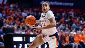 CHAMPAIGN, IL - JANUARY 18: Adalia McKenzie #24 of the Illinois Fighting Illini brings the ball up court during the game against the Indiana Hoosiers at State Farm Center on January 18, 2023 in Champaign, Illinois. (Photo by Michael Hickey/Getty Images)