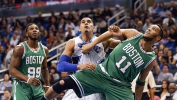 Jan 31, 2016; Orlando, FL, USA; Orlando Magic forward Tobias Harris (center) and Boston Celtics guard Evan Turner (11) and forward Jae Crowder (99) wait for the rebound during the second half of a basketball game at Amway Center. The Magic won 119-114. Mandatory Credit: Reinhold Matay-USA TODAY Sports