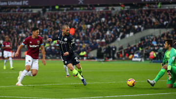 LONDON, ENGLAND - NOVEMBER 24: David Silva of Manchester City scores his sides first goal during the Premier League match between West Ham United and Manchester City at London Stadium on November 24, 2018 in London, United Kingdom. (Photo by Catherine Ivill/Getty Images)