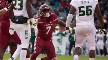 PHILADELPHIA, PA - NOVEMBER 17: Ryquell Armstead #7 of the Temple Owls reacts in front of Mazzi Wilkins #23 and Juwuan Brown #56 of the South Florida Bulls after scoring a touchdown in the third quarter at Lincoln Financial Field on November 17, 2018 in Philadelphia, Pennsylvania. The Owls defeated the Bulls 27-17. (Photo by Mitchell Leff/Getty Images)