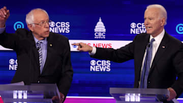 CHARLESTON, SOUTH CAROLINA - FEBRUARY 25: Democratic presidential candidate former Vice President Joe Biden speaks as Sen. Bernie Sanders (I-VT) (L) looks on during the Democratic presidential primary debate at the Charleston Gaillard Center on February 25, 2020 in Charleston, South Carolina. Seven candidates qualified for the debate, hosted by CBS News and Congressional Black Caucus Institute, ahead of South Carolina’s primary in four days. (Photo by Win McNamee/Getty Images)