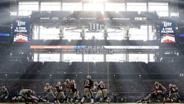 ARLINGTON, TX - OCTOBER 11: Quarterback Tom Brady #12 of the New England Patriots drops back to pass during the second half of the NFL game against the Dallas Cowboys at AT&T Stadium on October 11, 2015 in Arlington, Texas. The Patriots defeated the Cowboys 30-6. (Photo by Christian Petersen/Getty Images)