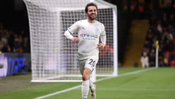 WATFORD, ENGLAND - DECEMBER 04: Bernardo Silva of Manchester City celebrates after scoring their side's third goal during the Premier League match between Watford and Manchester City at Vicarage Road on December 04, 2021 in Watford, England. (Photo by Richard Heathcote/Getty Images)