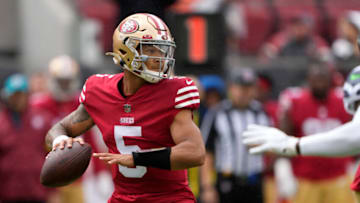 NFL trade rumors: Trey Lance #5 of the San Francisco 49ers looks to pass the ball against the Seattle Seahawks during the first quarter at Levi's Stadium on September 18, 2022 in Santa Clara, California. (Photo by Thearon W. Henderson/Getty Images)
