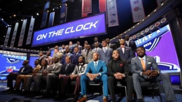 May 8, 2014; New York, NY, USA; NFL commissioner Roger Goodell poses for a photo with draft prospects in attendance on the stage before the 2014 NFL Draft at Radio City Music Hall. Mandatory Credit: Adam Hunger-USA TODAY Sports