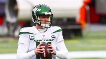 FOXBOROUGH, MA - JANUARY 03: Sam Darnold #14 of the New York Jets warms up before a game against the New England Patriots at Gillette Stadium on January 3, 2021 in Foxborough, Massachusetts. (Photo by Adam Glanzman/Getty Images)