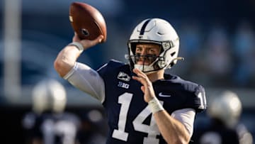 STATE COLLEGE, PA - DECEMBER 12: Sean Clifford #14 of the Penn State Nittany Lions warms up during the second half of the game against the Michigan State Spartans at Beaver Stadium on December 12, 2020 in State College, Pennsylvania. (Photo by Scott Taetsch/Getty Images)