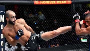 LAS VEGAS, NEVADA - AUGUST 28: (L-R) Giga Chikadze of Georgia kicks Edson Barboza of Brazil in a featherweight fight during the UFC Fight Night event at UFC APEX on August 28, 2021 in Las Vegas, Nevada. (Photo by Chris Unger/Zuffa LLC)