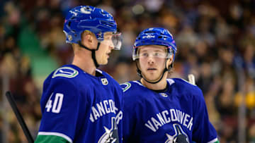 VANCOUVER, BC - DECEMBER 06: Vancouver Canucks Center Elias Pettersson (40) talks to Right wing Brock Boeser (6) during their NHL game against the Nashville Predators at Rogers Arena on December 6, 2018 in Vancouver, British Columbia, Canada. Vancouver won 5-3. (Photo by Derek Cain/Icon Sportswire via Getty Images)