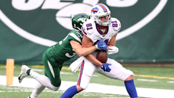 EAST RUTHERFORD, NEW JERSEY - OCTOBER 25: Tyler Kroft #81 of the Buffalo Bills makes the catch for a reception as Ashtyn Davis #32 of the New York Jets defends in the third quarter of the game at MetLife Stadium on October 25, 2020 in East Rutherford, New Jersey. (Photo by Elsa/Getty Images)