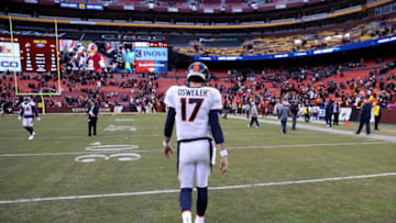 LANDOVER, MD - DECEMBER 24: Quarterback Brock Osweiler #17 of the Denver Broncos walks off the field following the Broncos 27-11 loss to the Washington Redskins at FedExField on December 24, 2017 in Landover, Maryland. (Photo by Rob Carr/Getty Images)