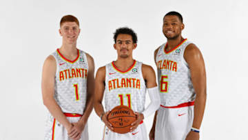 ATLANTA, GA - JUNE 25: Omari Spellman #6, Trae Young #11 and Kevin Huerter #1 of the Atlanta Hawks pose for a portrait after an introductory press conference on June 25, 2018 at Emory Healthcare Courts in Atlanta, Georgia. NOTE TO USER: User expressly acknowledges and agrees that, by downloading and/or using this Photograph, user is consenting to the terms and conditions of the Getty Images License Agreement. Mandatory Copyright Notice: Copyright 2018 NBAE (Photo by Scott Cunningham/NBAE via Getty Images)