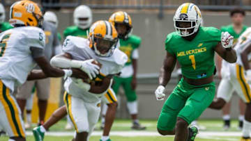 Auburn footballCarver’s Jaquavious Russaw (1) rushes the backfield during a spring game between Carver and Jeff Davis at Cramton Bowl in Montgomery, Ala., on Saturday, May 21, 2022.