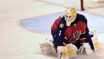 Jan 26, 2016; Sunrise, FL, USA; Florida Panthers goalie Roberto Luongo (1) reaches for his stick during the third period of his team