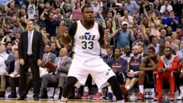 Mar 18, 2015; Salt Lake City, UT, USA; Utah Jazz forward Trevor Booker (33) celebrates after scoring two points against the Washington Wizards during the fourth quarter at EnergySolutions Arena. Washington Wizards won the game 88-84. Mandatory Credit: Chris Nicoll-USA TODAY Sports