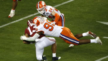 SANTA CLARA, CALIFORNIA - JANUARY 07: Clelin Ferrell #99 of the Clemson Tigers tackles Tua Tagovailoa #13 of the Alabama Crimson Tide on fourth down during the fourth quarter in the College Football Playoff National Championship at Levi's Stadium on January 07, 2019 in Santa Clara, California. (Photo by Lachlan Cunningham/Getty Images)