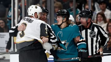 SAN JOSE, CALIFORNIA - MARCH 18: Brayden McNabb #3 of the Vegas Golden Knights and Marcus Sorensen #20 of the San Jose Sharks are held apart by referees at SAP Center on March 18, 2019 in San Jose, California. (Photo by Ezra Shaw/Getty Images)