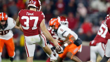 Oklahoma's Michael Turk (37) punts a ball in the second half during the Bedlam college football game between the University of Oklahoma Sooners (OU) and the Oklahoma State University Cowboys (OSU) at Gaylord Family-Oklahoma Memorial Stadium, in Norman, Okla., Saturday, Nov., 19, 2022.Presto Id