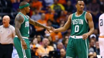 Feb 23, 2015; Phoenix, AZ, USA; Boston Celtics guard Isaiah Thomas (4) and guard Avery Bradley (0) against the Phoenix Suns at US Airways Center. The Celtics defeats the Suns 115-110. Mandatory Credit: Mark J. Rebilas-USA TODAY Sports