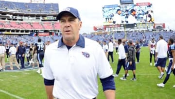 Dec 27, 2015; Nashville, TN, USA; Tennessee Titans interim head coach Mike Mularkey leaves the field after a loss against the Houston Texans at Nissan Stadium. The Texans won 34-6. Mandatory Credit: Christopher Hanewinckel-USA TODAY Sports