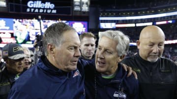 Nov 13, 2016; Foxborough, MA, USA; New England Patriots head coach Bill Belichick and Seattle Seahawks head coach Pete Carroll greet after the game at Gillette Stadium. The Seattle Seahawks won 31-24. Mandatory Credit: Greg M. Cooper-USA TODAY Sports