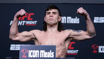 LAS VEGAS, NEVADA - DECEMBER 17: Ricky Simon poses on the scale during the UFC Fight Night weigh-in at UFC APEX on December 17, 2021 in Las Vegas, Nevada. (Photo by Jeff Bottari/Zuffa LLC)
