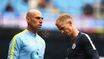 MANCHESTER, ENGLAND - AUGUST 13: Willy Cabellero of Manchester City (L) and Joe Hart of Manchester City (R) warm up prior to kick off during the Premier League match between Manchester City and Sunderland at Etihad Stadium on August 13, 2016 in Manchester, England. (Photo by Stu Forster/Getty Images)