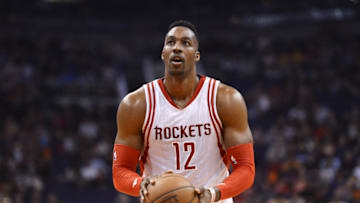 Feb 19, 2016; Phoenix, AZ, USA; Houston Rockets center Dwight Howard (12) shoots a free throw against the Phoenix Suns during the second half at Talking Stick Resort Arena. The Rockets won 116-100. Mandatory Credit: Joe Camporeale-USA TODAY Sports