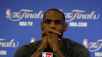 Jun 12, 2014; Miami, FL, USA; Miami Heat forward LeBron James speaks to the media after game four of the 2014 NBA Finals against the San Antonio Spurs at American Airlines Arena. Mandatory Credit: Robert Mayer-USA TODAY Sports